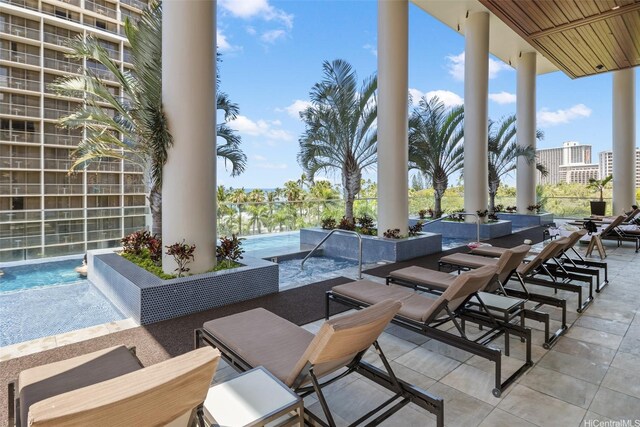 223 Saratoga Rd Unit 1916, Honolulu, HI 96815 - view of patio / terrace with an outdoor pool and outdoor dining area