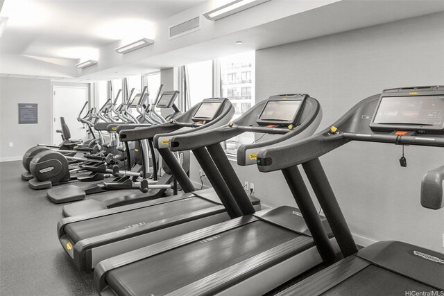 223 Saratoga Rd Unit 1916, Honolulu, HI 96815 - exercise room with baseboards