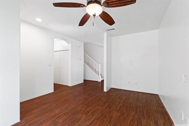 91-2131 Kaioli St Unit 3405, Ewa Beach, HI 96706 - unfurnished room featuring wood finished floors, stairway, arched walkways, ceiling fan, and recessed lighting
