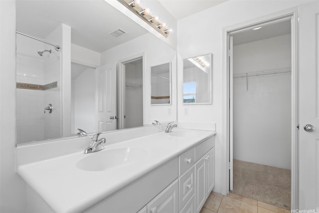 91-2131 Kaioli St Unit 3405, Ewa Beach, HI 96706 - bathroom with double vanity, a spacious closet, tile patterned floors, and tiled shower