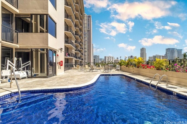 1850 Ala Moana Blvd Unit 1107, Honolulu, HI 96815 - community pool with a patio and a city view