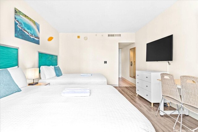 1850 Ala Moana Blvd Unit 1107, Honolulu, HI 96815 - bedroom with wood finished floors
