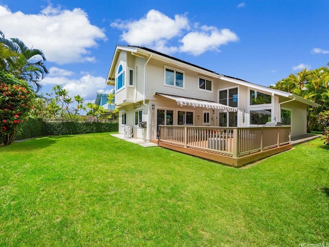 1586 Paukiki St, Kailua, HI 96734 - back of property with a wooden deck and a lawn