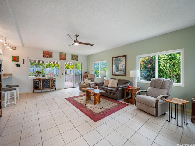 1586 Paukiki St, Kailua, HI 96734 - living room featuring ceiling fan, light tile patterned flooring, a textured ceiling, and track lighting