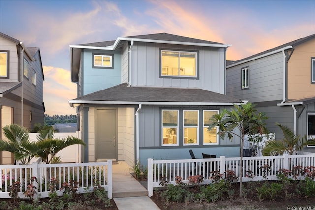 91-1101 Franklin D Roosevelt Ave Unit 335, Kapolei, HI 96707 - view of front of home featuring board and batten siding and a shingled roof