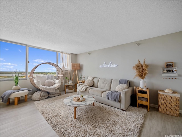 1060 Kamehameha Hwy Unit 2103A, Pearl City, HI 96782 - living room featuring wood finished floors and a textured ceiling