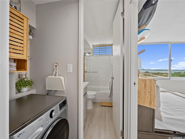 1060 Kamehameha Hwy Unit 2103A, Pearl City, HI 96782 - laundry room with washer / dryer and light wood finished floors