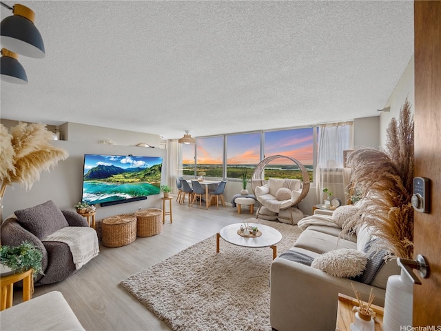 1060 Kamehameha Hwy Unit 2103A, Pearl City, HI 96782 - living room with a textured ceiling and wood finished floors