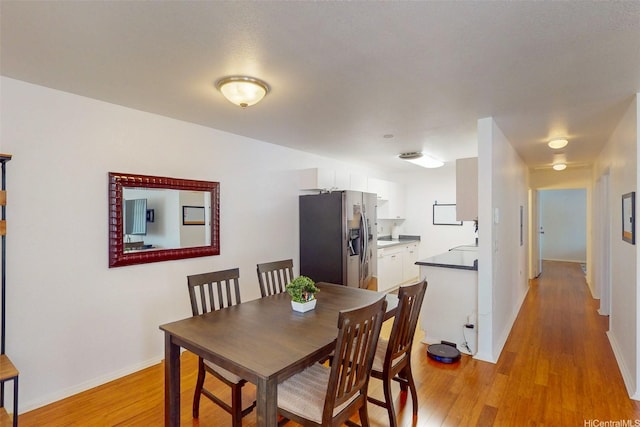 91-1105 Namahoe St Unit 2G, Kapolei, HI 96707 - dining area featuring light wood-style flooring
