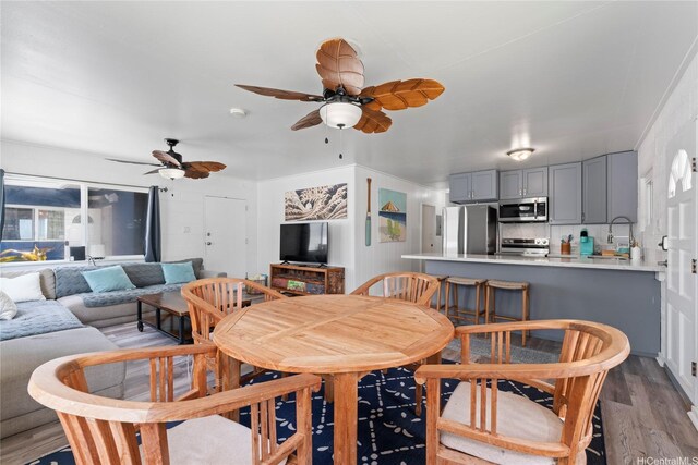 54-257 Kaipapau Loop, Hauula, HI 96717 - dining space with ceiling fan and wood finished floors