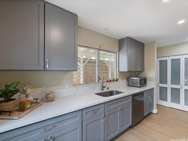 1549 Kanapuu Dr, Kailua, HI 96734 - kitchen with gray cabinetry, appliances with stainless steel finishes, light wood-style flooring, and recessed lighting