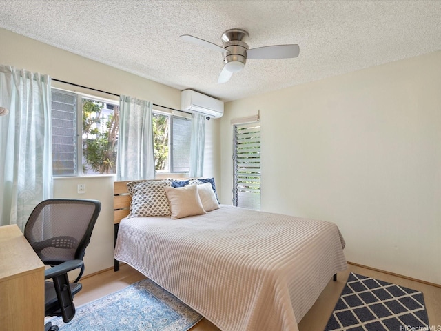 1549 Kanapuu Dr, Kailua, HI 96734 - bedroom with an AC wall unit, a textured ceiling, and ceiling fan