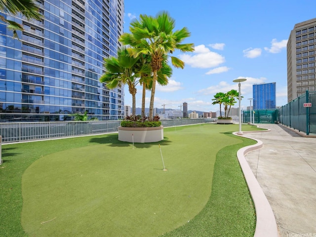 1288 Kapiolani Blvd Unit I2808, Honolulu, HI 96814 - view of property's community featuring a view of city and a putting area