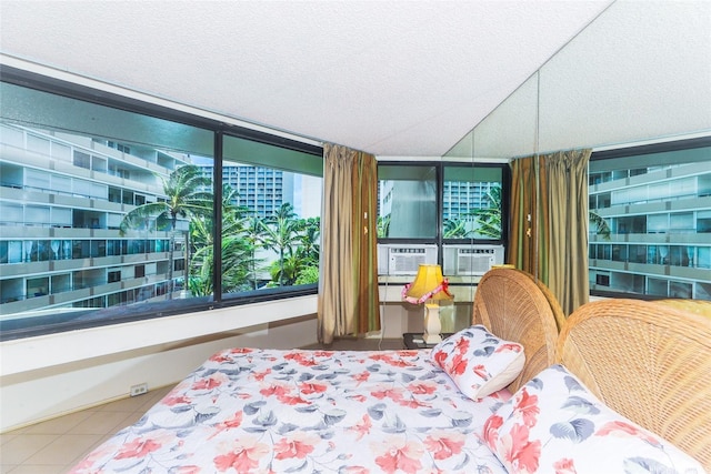 1700 Ala Moana Blvd Unit 603, Honolulu, HI 96815 - tiled bedroom featuring a textured ceiling and cooling unit