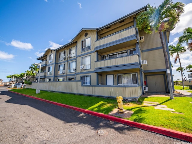 91-265 Hanapouli Cir Unit 16J, Ewa Beach, HI 96706 - view of building exterior with cooling unit