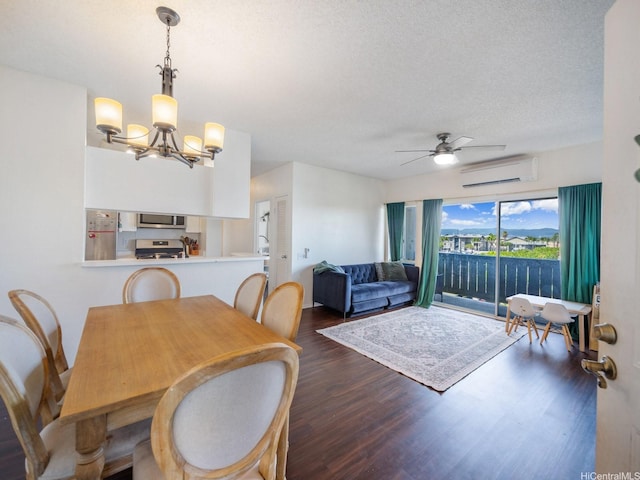 91-265 Hanapouli Cir Unit 16J, Ewa Beach, HI 96706 - dining space with a wall mounted AC, dark wood-style flooring, a chandelier, a textured ceiling, and ceiling fan
