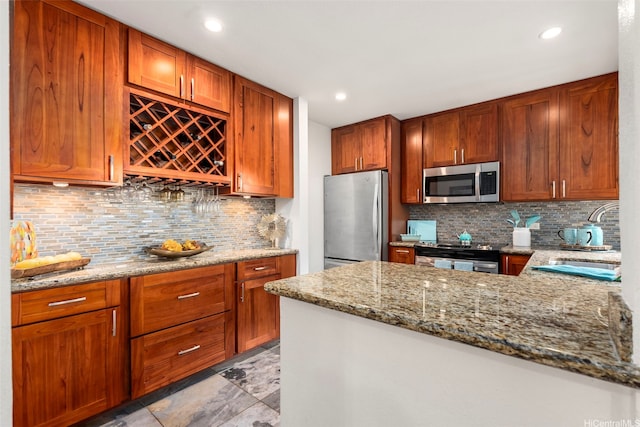 46-160 Kiowai St Unit 2322, Kaneohe, HI 96744 - kitchen with appliances with stainless steel finishes, light stone counters, decorative backsplash, light marble finish floors, and recessed lighting