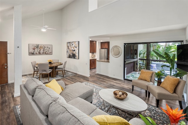 46-160 Kiowai St Unit 2322, Kaneohe, HI 96744 - living room featuring dark wood-style flooring, a ceiling fan, and high vaulted ceiling