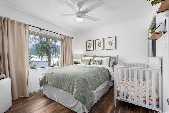 46-160 Kiowai St Unit 2322, Kaneohe, HI 96744 - bedroom with wood finished floors and ceiling fan