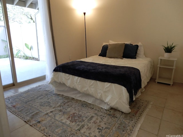 45-995 Wailele Rd Unit 29, Kaneohe, HI 96744 - bedroom with light tile patterned floors and access to exterior