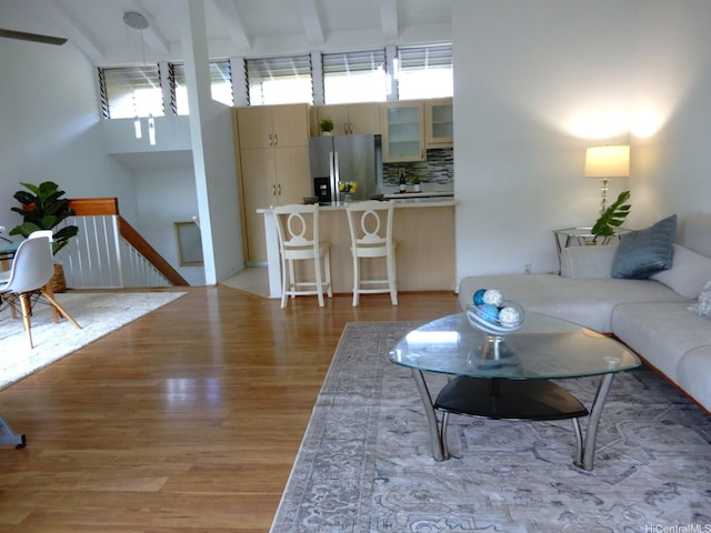 45-995 Wailele Rd Unit 29, Kaneohe, HI 96744 - living room with beamed ceiling and light wood-style floors