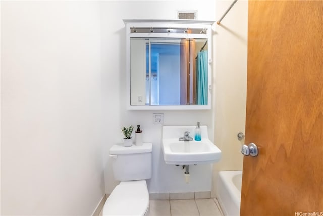 1511 Nuuanu Ave Unit 625, Honolulu, HI 96817 - full bathroom with toilet and tile patterned flooring