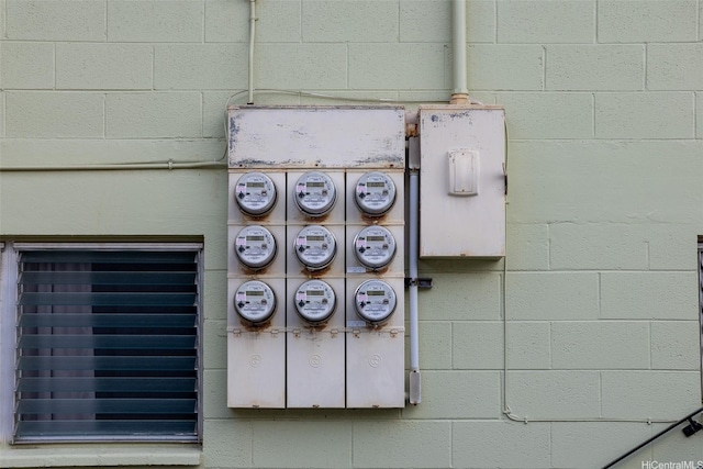 1313 Ahiahi St, Honolulu, HI 96817 - exterior view of electric meter and concrete block siding