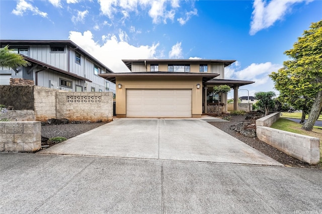 95-1021 Hoama St, Mililani, HI 96789 - view of front facade featuring concrete driveway and an attached garage