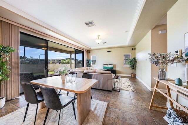 95-1021 Hoama St, Mililani, HI 96789 - dining room featuring stone tile floors and a tray ceiling