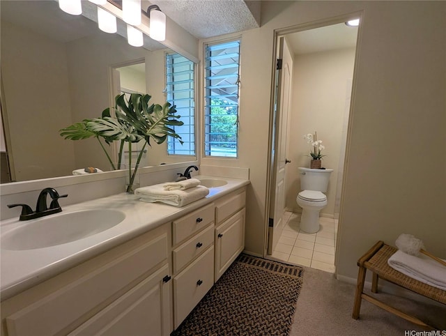 46-426 Hololio St, Kaneohe, HI 96744 - bathroom featuring double vanity, healthy amount of natural light, and tile patterned flooring