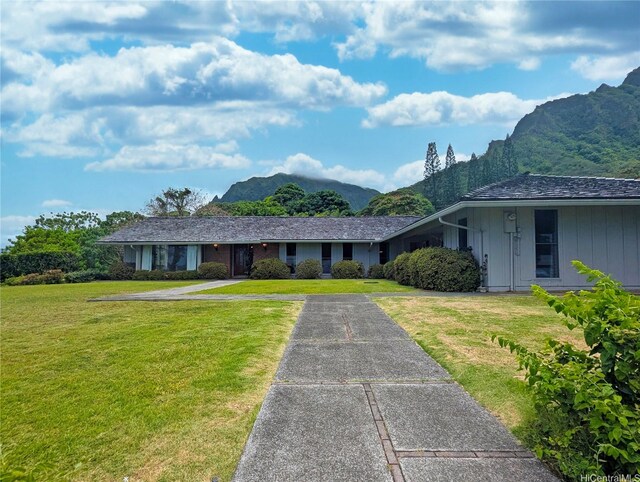 46-426 Hololio St, Kaneohe, HI 96744 - ranch-style house featuring a mountain view and a front yard