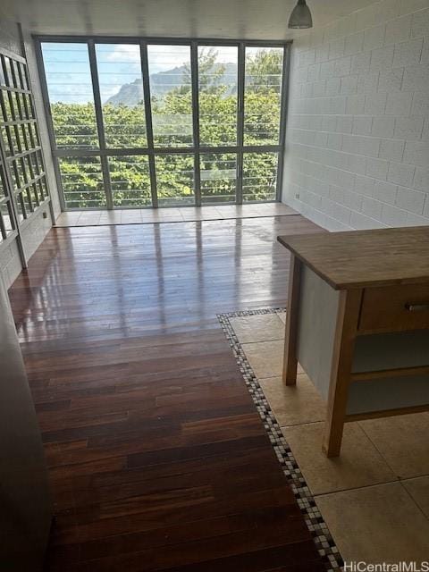 53-549 Kamehameha Hwy Unit 618, Hauula, HI 96717 - hall featuring tile patterned flooring and concrete block wall