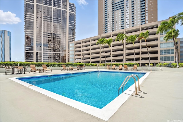 876 Curtis St Unit 3009, Honolulu, HI 96813 - community pool featuring a patio and a city view