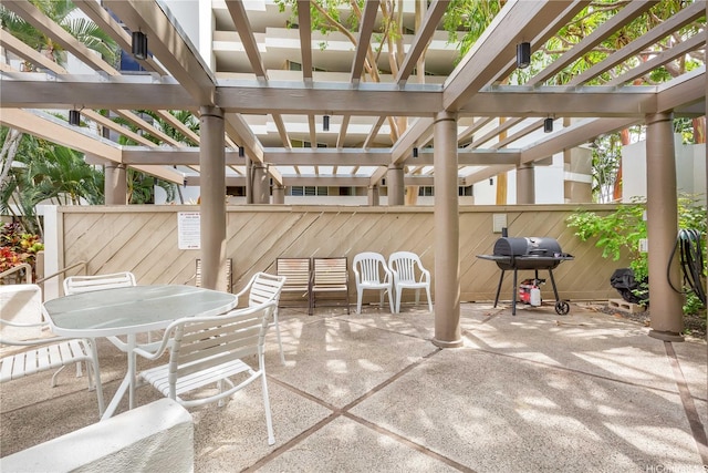 965 Prospect St Unit 604, Honolulu, HI 96822 - view of patio / terrace featuring a pergola, grilling area, and outdoor dining space