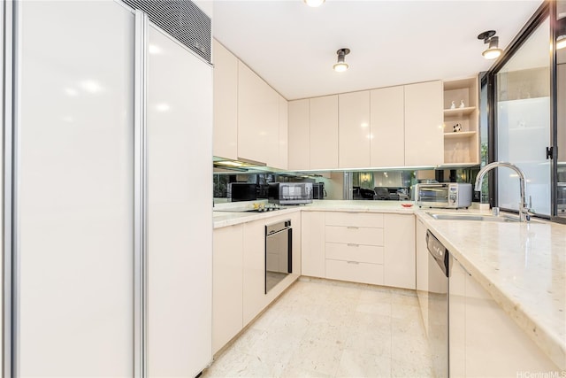 965 Prospect St Unit 604, Honolulu, HI 96822 - kitchen featuring appliances with stainless steel finishes, modern cabinets, light stone countertops, open shelves, and white cabinets