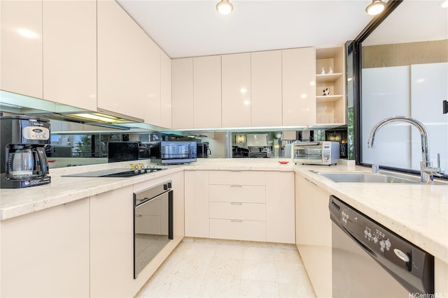 965 Prospect St Unit 604, Honolulu, HI 96822 - kitchen with stainless steel appliances, modern cabinets, and light stone counters
