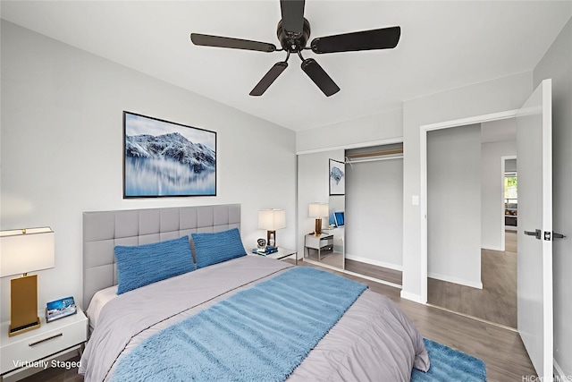 94-557 Alapoai St Unit 154, Mililani, HI 96789 - bedroom with wood finished floors, a ceiling fan, and a closet