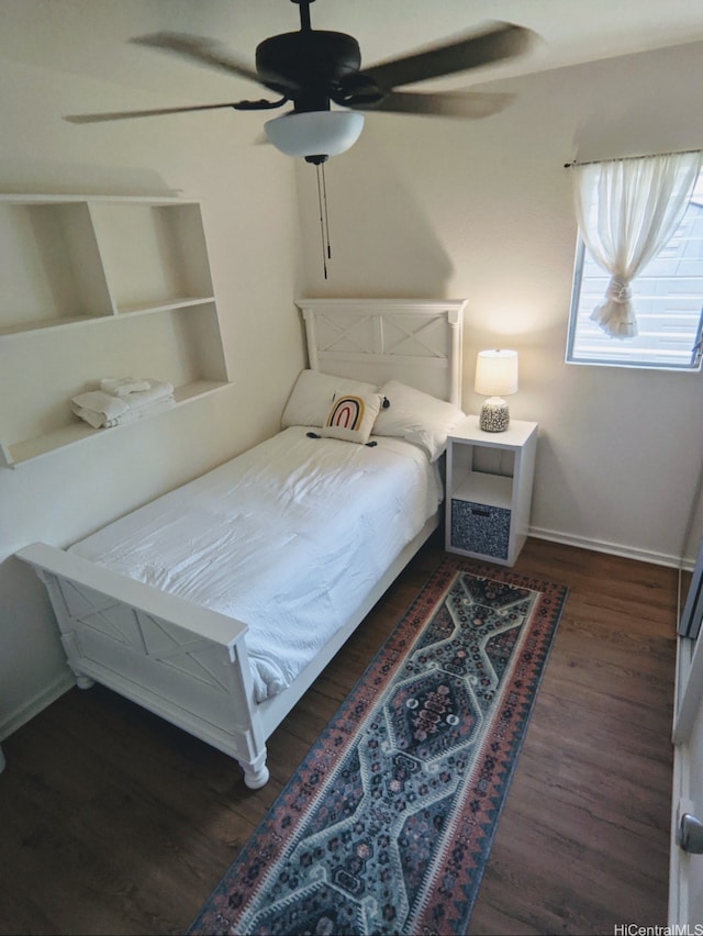 66-924 Kamakahala St, Waialua, HI 96791 - bedroom with wood finished floors and ceiling fan