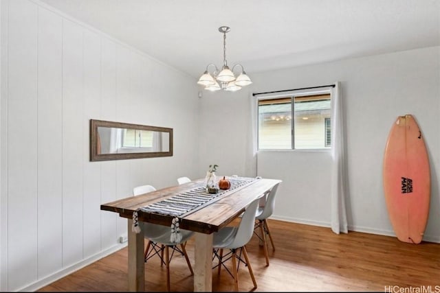 66-924 Kamakahala St, Waialua, HI 96791 - dining area featuring light wood-style flooring and a chandelier