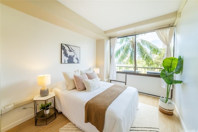 2333 Kapiolani Blvd Unit 311, Honolulu, HI 96826 - bedroom featuring wood finished floors