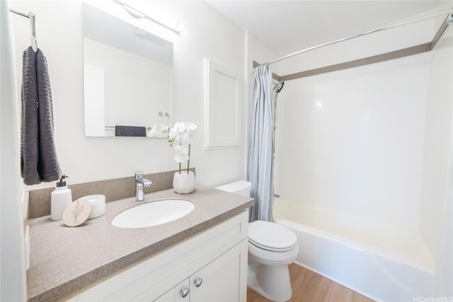 2333 Kapiolani Blvd Unit 311, Honolulu, HI 96826 - full bathroom with vanity, shower / bath combination with curtain, and wood finished floors