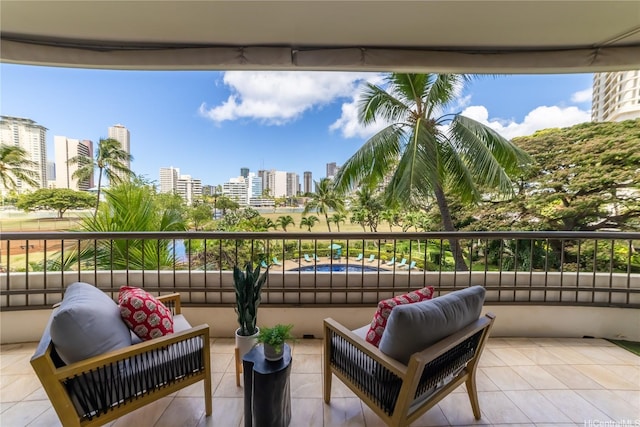 2333 Kapiolani Blvd Unit 311, Honolulu, HI 96826 - patio / terrace featuring a city view
