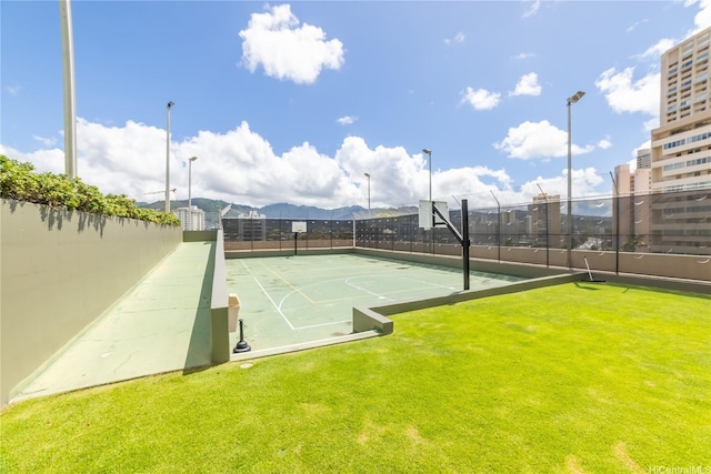 2333 Kapiolani Blvd Unit 311, Honolulu, HI 96826 - view of tennis court featuring community basketball court