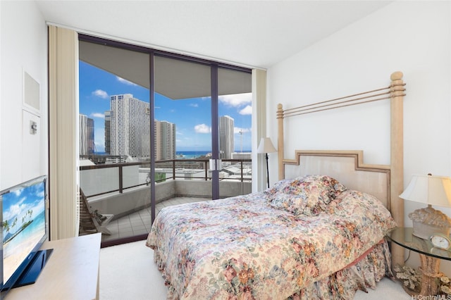 725 Kapiolani Blvd Unit 1201, Honolulu, HI 96813 - bedroom with floor to ceiling windows, access to exterior, a view of city, and carpet floors