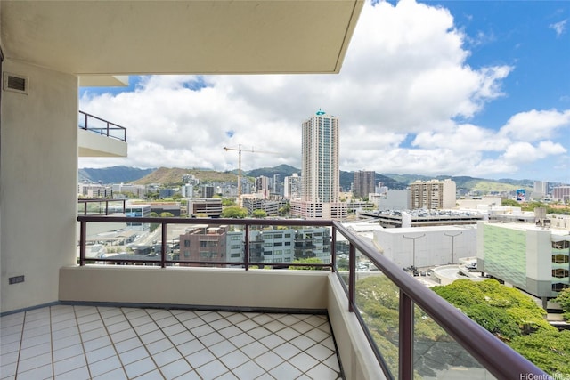 725 Kapiolani Blvd Unit 1201, Honolulu, HI 96813 - balcony with a city view and a mountain view