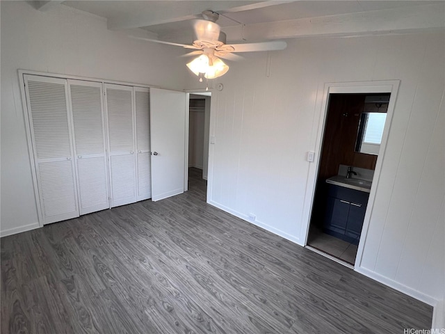 2212 Amokemoke St, Pearl City, HI 96782 - unfurnished bedroom with beamed ceiling, dark wood-type flooring, a closet, ensuite bathroom, and ceiling fan