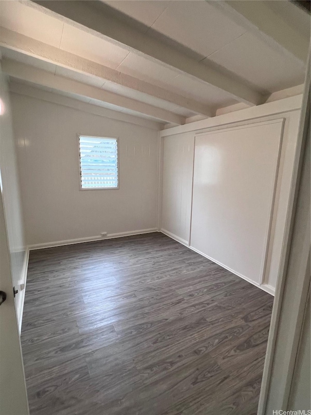 2212 Amokemoke St, Pearl City, HI 96782 - unfurnished room with beam ceiling and dark wood-style flooring