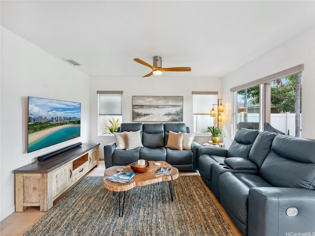 91-1032 Kaikane St, Ewa Beach, HI 96706 - living area featuring a ceiling fan and light wood-type flooring