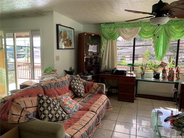 1617 Kamehameha Iv Rd, Honolulu, HI 96819 - living area featuring a textured ceiling, light tile patterned floors, and ceiling fan