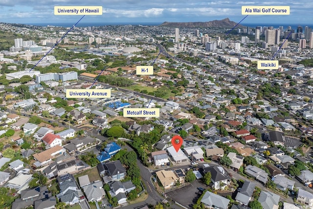 1849 Vancouver Pl, Honolulu, HI 96822 - aerial view of property and surrounding area featuring nearby urban area and a mountainous background